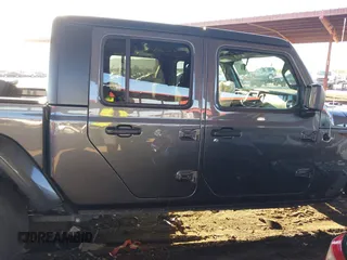 2021 Jeep Gladiator Willys with VIN 1C6HJTAG2ML507426, listed as a IAAI auction lot 41407608 with 49,554 mi miles and . Bid and sale history available at carsss.com. Image 14.