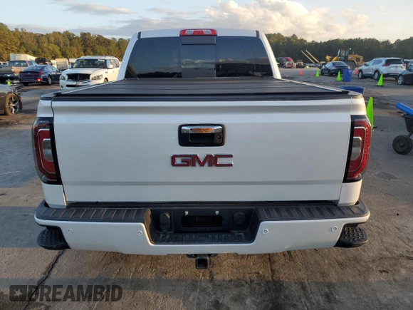 2017 GMC Sierra 1500 Denali z VIN 3GTU2PEJ3HG473081, wystawiony jako Copart lot #78945404 z przebiegiem 137 797 mil mil oraz Szkoda całkowita • Salvage title. Historia ofert i sprzedaży dostępna na DreamBid. Obrazek 6.