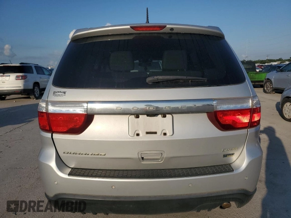 2013 Dodge Durango Crew with VIN 1C4RDHDG1DC616909, listed as a Copart auction lot 61923565 with 98,264 mi miles and Salvage title. Bid and sale history available at DreamBid. Image 6.