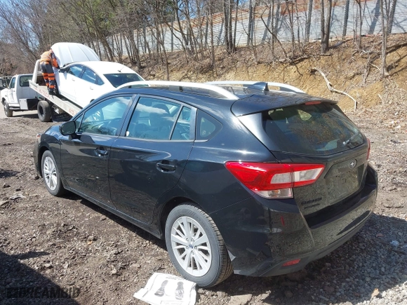 2017 Subaru Impreza Premium with VIN 4S3GTAD65H3716428, listed as a IAAI auction lot 41942299 with 77,181 mi miles. Bid and sale history available at carsss.com. Image 3.