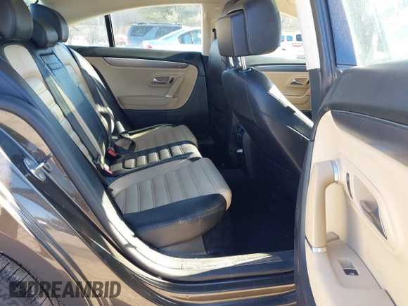 2013 Volkswagen CC Lux with VIN WVWRP7ANXDE522469, listed as a IAAI auction lot 41413025 with 115,117 mi miles. Bid and sale history available at carsss.com. Image 8.