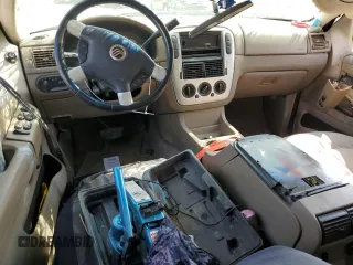 2002 Mercury Mountaineer z VIN 4M2ZU86E32ZJ27444, wystawiony jako Copart lot #75109744 z przebiegiem 194 298 mil mil oraz Szkody całkowita. Historia ofert i sprzedaży dostępna na DreamBid. Obrazek 8.