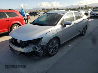 2020 Honda Clarity Touring z VIN JHMZC5F3XLC001848, wystawiony jako Copart lot #56748915 z przebiegiem 89 652 mil mil oraz Szkoda całkowita • Salvage title. Historia ofert i sprzedaży dostępna na DreamBid. Obrazek 1.