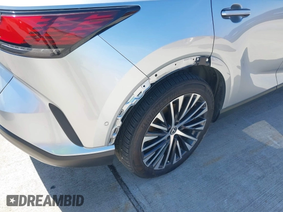 2024 Lexus RX with VIN 2T2BAMBA5RC029138, listed as a IAAI auction lot 41709254 with 22,576 mi miles. Bid and sale history available at carsss.com. Image 17.