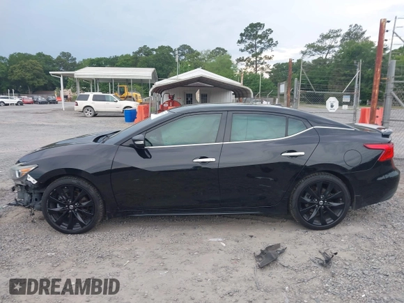 2018 Nissan Maxima Platinum z VIN 1N4AA6AP9JC392479, wystawiony jako IAAI lot #42209148 z przebiegiem 103 710 mil mil oraz . Historia ofert i sprzedaży dostępna na DreamBid. Obrazek 14.