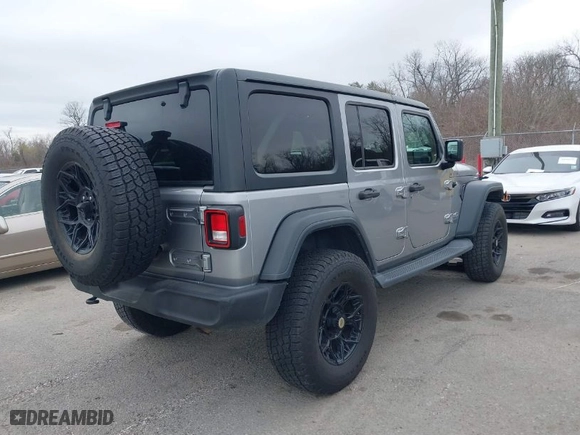 2019 Jeep Wrangler Unlimited Sport with VIN 1C4HJXDG4KW518726, listed as a IAAI auction lot 41597892 with 68,842 mi miles. Bid and sale history available at carsss.com. Image 4.
