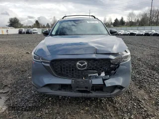 2024 Mazda CX-5 S Carbon Edition z VIN JM3KFBCM4R0392759, wystawiony jako Copart lot #45571245 z przebiegiem 7594 mil mil oraz Szkody całkowita. Historia ofert i sprzedaży dostępna na DreamBid. Obrazek 5.