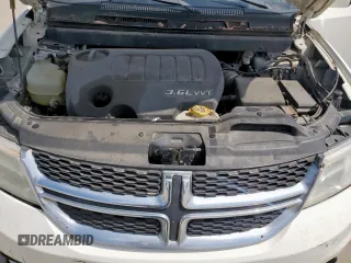 2012 Dodge Journey SXT z VIN 3C4PDCBG9CT213423, wystawiony jako Copart lot #65246735 z przebiegiem 319 806 mil mil oraz Szkoda całkowita • Salvage title. Historia ofert i sprzedaży dostępna na DreamBid. Obrazek 12.