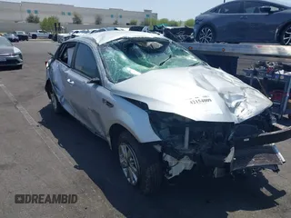 2017 Kia Optima LX z VIN KNAGT4L32H5157432, wystawiony jako IAAI lot #42154009 z przebiegiem 83 496 mil mil oraz . Historia ofert i sprzedaży dostępna na DreamBid. Obrazek 1.