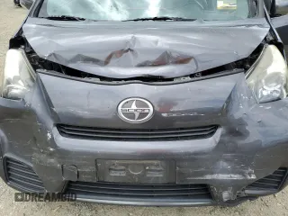 2012 Scion iQ z VIN JTNJJXB06CJ009187, wystawiony jako Copart lot #56563665 z przebiegiem 105 014 mil mil oraz Szkoda całkowita • Salvage title. Historia ofert i sprzedaży dostępna na DreamBid. Obrazek 11.