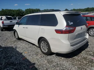 2015 Toyota Sienna XLE with VIN 5TDYK3DC3FS624612, listed as a Copart auction lot 57309295 with 188,467 mi miles and Salvage title. Bid and sale history available at DreamBid. Image 2.