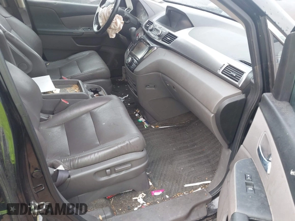 2015 Honda Odyssey Touring Elite with VIN 5FNRL5H90FB065004, listed as a IAAI auction lot 42461597 with 317,523 mi miles and . Bid and sale history available at DreamBid. Image 5.