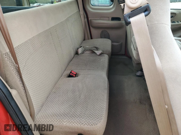 1999 Ford F-150 with VIN 1FTZX1725XNA33332, listed as a Copart auction lot 51867455 with 163,023 mi miles and Salvage title. Bid and sale history available at DreamBid. Image 10.