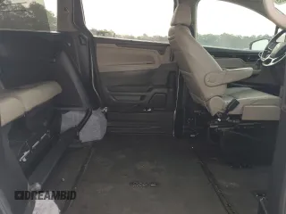 2021 Honda Odyssey Touring z VIN 5FNRL6H83MB041063, wystawiony jako Copart lot #48914835 z przebiegiem 23 556 mil mil oraz Szkoda całkowita • Salvage title. Historia ofert i sprzedaży dostępna na DreamBid. Obrazek 11.