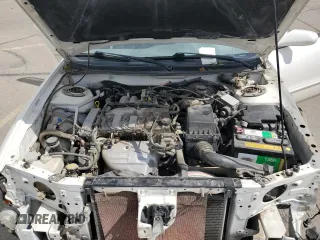 2000 Mazda 626 LX z VIN 1YVGF22C3Y5165341, wystawiony jako Copart lot #56575075 z przebiegiem 58 645 mil mil oraz Szkody całkowita. Historia ofert i sprzedaży dostępna na DreamBid. Obrazek 11.