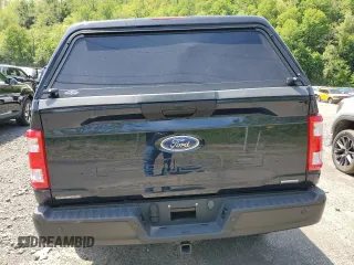 2023 Ford F-150 with VIN 1FTFW1P83PKE89261, listed as a Copart auction lot 56625325 with 9,079 mi miles and Salvage title. Bid and sale history available at DreamBid. Image 6.