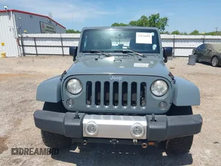 2014 Jeep Wrangler Unlimited Sahara with VIN 1C4BJWEG5EL326980, listed as a IAAI auction lot 42031659 with 116,181 mi miles and . Bid and sale history available at DreamBid. Image 12.