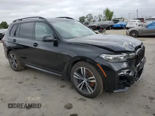 2020 BMW X7 M50i z VIN 5UXCX6C04L9B99921, wystawiony jako Copart lot #56665755 z przebiegiem 63 328 mil mil oraz Szkoda całkowita • Salvage title. Historia ofert i sprzedaży dostępna na DreamBid. Obrazek 4.