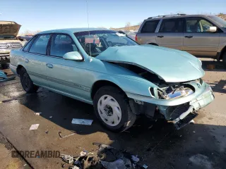 1995 Ford Taurus GL z VIN 1FALP5242SG181625, wystawiony jako Copart lot #81184774 z przebiegiem 107 385 mil mil oraz Szkoda całkowita • Salvage title. Historia ofert i sprzedaży dostępna na DreamBid. Obrazek 4.