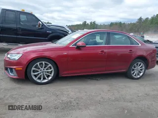 2019 Audi A4 Premium Plus z VIN WAUENAF49KN004753, wystawiony jako IAAI lot #42012315 z przebiegiem 105 208 mil mil oraz . Historia ofert i sprzedaży dostępna na DreamBid. Obrazek 14.