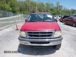1998 Ford F-150 with VIN 1FTZX1768WNB10115, listed as a IAAI auction lot 42144769 with 294,775 mi miles and . Bid and sale history available at DreamBid. Image 12.