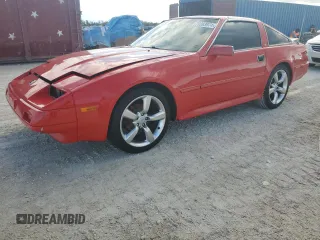1986 Nissan 300ZX z VIN JN1HZ14S3GX148058, wystawiony jako Copart lot #79263974 z przebiegiem 233 724 mil mil oraz Szkoda całkowita • Salvage title. Historia ofert i sprzedaży dostępna na DreamBid. Obrazek 1.