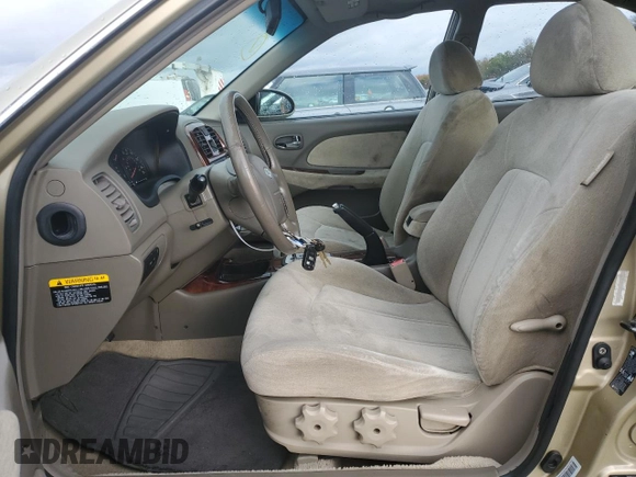 2003 Hyundai Sonata GLS with VIN KMHWF35H23A803752, listed as a Copart auction lot 79953044 with 105,538 mi miles and Salvage Title. Bid and sale history available at carsss.com. Image 7.