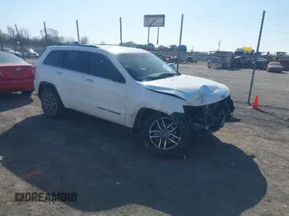2019 Jeep Grand Cherokee Limited with VIN 1C4RJFBG3KC734697, listed as a IAAI auction lot 41645913 with 128,419 mi miles. Bid and sale history available at carsss.com. Image 1.