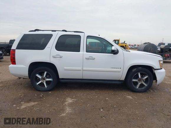2007 Chevrolet Tahoe LT z VIN 1GNFK13017R359487, wystawiony jako IAAI lot #41744464 z przebiegiem 207 832 mil mil oraz . Historia ofert i sprzedaży dostępna na DreamBid. Obrazek 14.