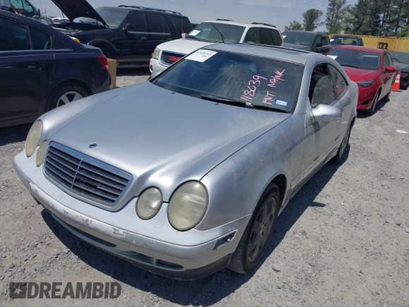 2002 Mercedes-Benz CLK 320/430 with VIN WDBLJ65G82T118039, listed as a IAAI auction lot 41929153 with 232,989 mi miles and . Bid and sale history available at DreamBid. Image 2.