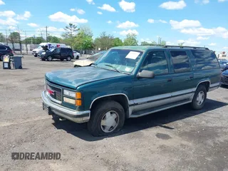 1997 GMC Suburban with VIN 1GKFK16R6VJ706590, listed as a IAAI auction lot 42194855 with 155,680 mi miles and . Bid and sale history available at DreamBid. Image 2.