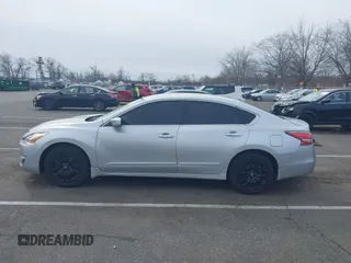 2015 Nissan Altima S with VIN 1N4AL3AP0FC581571, listed as a IAAI auction lot 41618045 with 106,394 mi miles and . Bid and sale history available at DreamBid. Image 14.