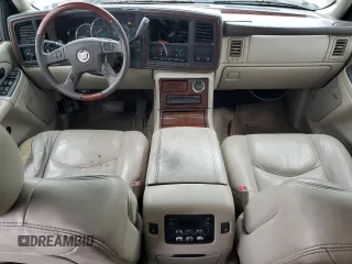 2005 Cadillac Escalade z VIN 1GYEK63N95R204674, wystawiony jako Copart lot #55854175 z przebiegiem 303 771 mil mil oraz Tytuł czysty. Historia ofert i sprzedaży dostępna na DreamBid. Obrazek 8.