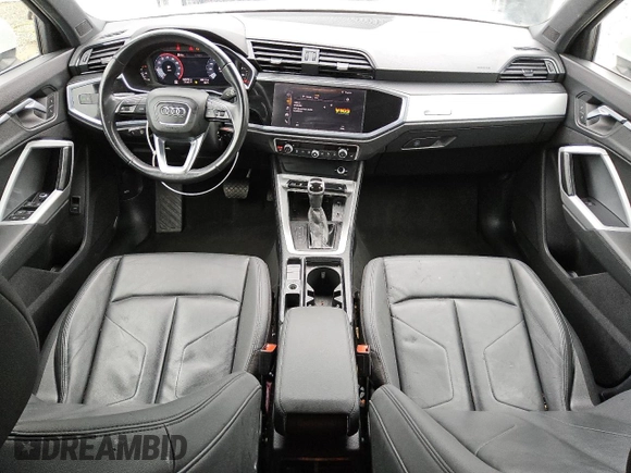 2021 Audi Q3 Premium with VIN WA1AUCF34M1090677, listed as a Copart auction lot 56111815 with 93,573 mi miles and Clean title. Bid and sale history available at DreamBid. Image 8.