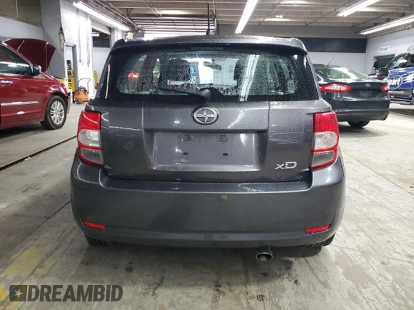 2012 Scion xD z VIN JTKKU4B43C1026426, wystawiony jako Copart lot #55339955 z przebiegiem 106 648 mil mil oraz Szkoda całkowita • Salvage title. Historia ofert i sprzedaży dostępna na DreamBid. Obrazek 6.