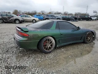1992 Mitsubishi 3000GT z VIN JA3XE74C2NY028905, wystawiony jako Copart lot #81549834 z przebiegiem 131 349 mil mil oraz Szkody całkowita. Historia ofert i sprzedaży dostępna na DreamBid. Obrazek 3.