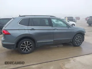 2021 Volkswagen Tiguan SE with VIN 3VV2B7AX8MM143189, listed as a IAAI auction lot 41646843 with 56,672 mi miles and . Bid and sale history available at DreamBid. Image 13.