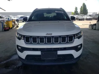 2025 Jeep Compass Latitude with VIN 3C4NJDBNXST547107, listed as a Copart auction lot 56147275 with 8,460 mi miles and Salvage title. Bid and sale history available at DreamBid. Image 5.