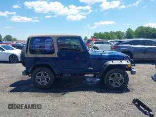 2001 Jeep Wrangler SE with VIN 1J4FA29P01P344644, listed as a IAAI auction lot 42170936 with 130,938 mi miles and . Bid and sale history available at DreamBid. Image 13.