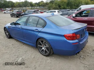 2014 BMW M5 z VIN WBSFV9C5XED097563, wystawiony jako Copart lot #72175354 z przebiegiem 73 406 mil mil oraz Szkody całkowita. Historia ofert i sprzedaży dostępna na DreamBid. Obrazek 2.