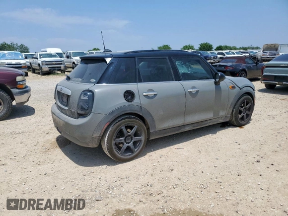 2015 MINI Hardtop 4 Door с VIN WMWXS5C51FT830794, выставлен на аукционе Copart как лот 57451785 с пробегом 171 669 миль миль и Списание • Salvage title. История ставок и продаж доступна на DreamBid. Изображение 3.