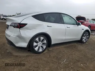 2024 Tesla Model Y Long Range z VIN 7SAYGDEE5RF075756, wystawiony jako Copart lot #48819465 z przebiegiem 10 457 mil mil oraz Szkoda całkowita • Salvage title. Historia ofert i sprzedaży dostępna na DreamBid. Obrazek 3.