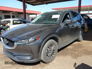 2021 Mazda CX-5 Touring with VIN JM3KFACM2M1313750, listed as a IAAI auction lot 41762938 with 68,503 mi miles. Bid and sale history available at carsss.com. Image 17.