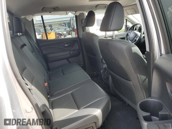 2019 Honda Ridgeline RTL with VIN 5FPYK3F57KB001594, listed as a Copart auction lot 59020335 with 31,465 mi miles and Salvage title. Bid and sale history available at DreamBid. Image 11.