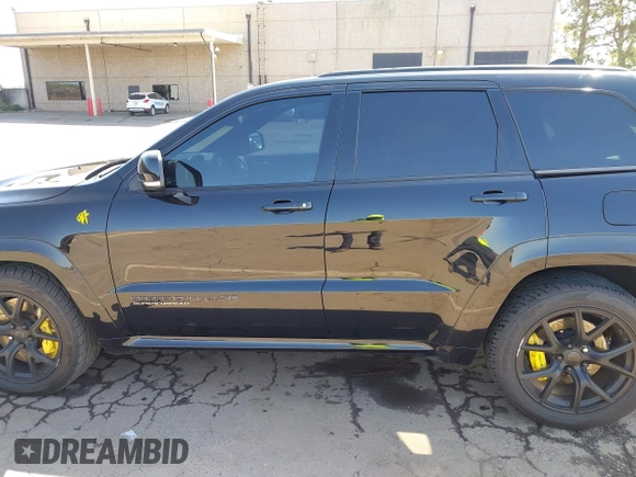 2020 Jeep Grand Cherokee Trackhawk with VIN 1C4RJFN96LC336561, listed as a IAAI auction lot 41991800 with 58,781 mi miles and . Bid and sale history available at DreamBid. Image 14.