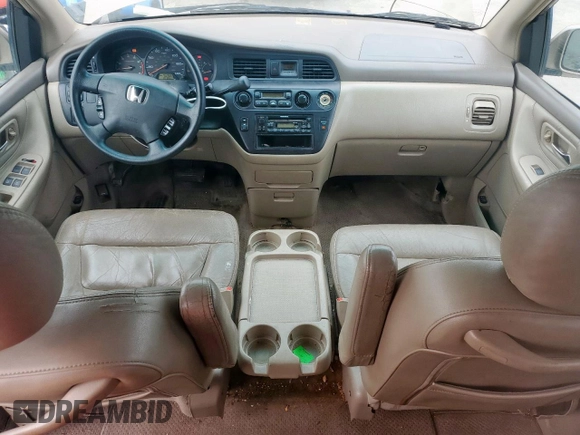 2004 Honda Odyssey EX-L with VIN 5FNRL18944B107051, listed as a Copart auction lot 58542335 with 207,951 mi miles and Salvage title. Bid and sale history available at DreamBid. Image 8.