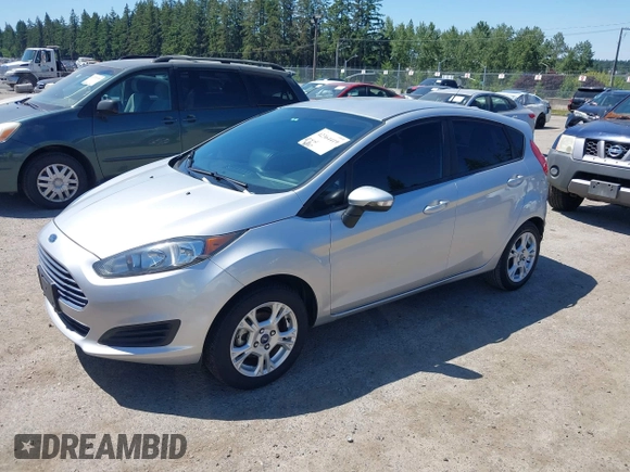 2016 Ford Fiesta SE z VIN 3FADP4EJ0GM122392, wystawiony jako IAAI lot #42364419 z przebiegiem 98 357 mil mil oraz . Historia ofert i sprzedaży dostępna na DreamBid. Obrazek 2.