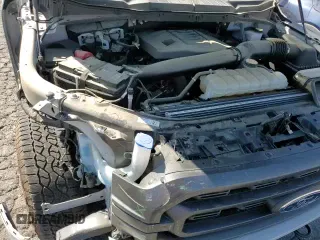 2023 Ford F-150 XLT with VIN 1FTFW1E83PKE26471, listed as a Copart auction lot 84623525 with 27,743 mi miles and Salvage title. Bid and sale history available at DreamBid. Image 14.