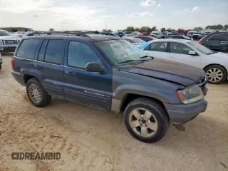 2004 Jeep Grand Cherokee with VIN 1J8GX58J54C121513, listed as a Copart auction lot 59384005 with 221,397 mi miles and Salvage title. Bid and sale history available at DreamBid. Image 4.