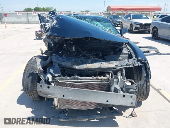 2014 Chevrolet Camaro LS z VIN 2G1FA1E32E9126043, wystawiony jako IAAI lot #42253189 z przebiegiem 104 457 mil mil oraz . Historia ofert i sprzedaży dostępna na DreamBid. Obrazek 12.
